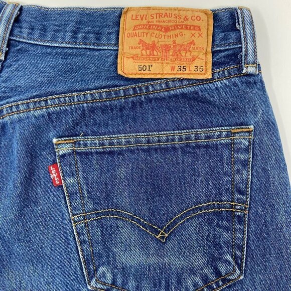 LEVIS | Distressed Denim Cut-Off Shorts - Picture 4 of 10